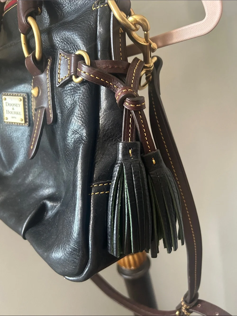Dooney & Bourke Black Leather Satchel with Brown Trim and Gold Hardware